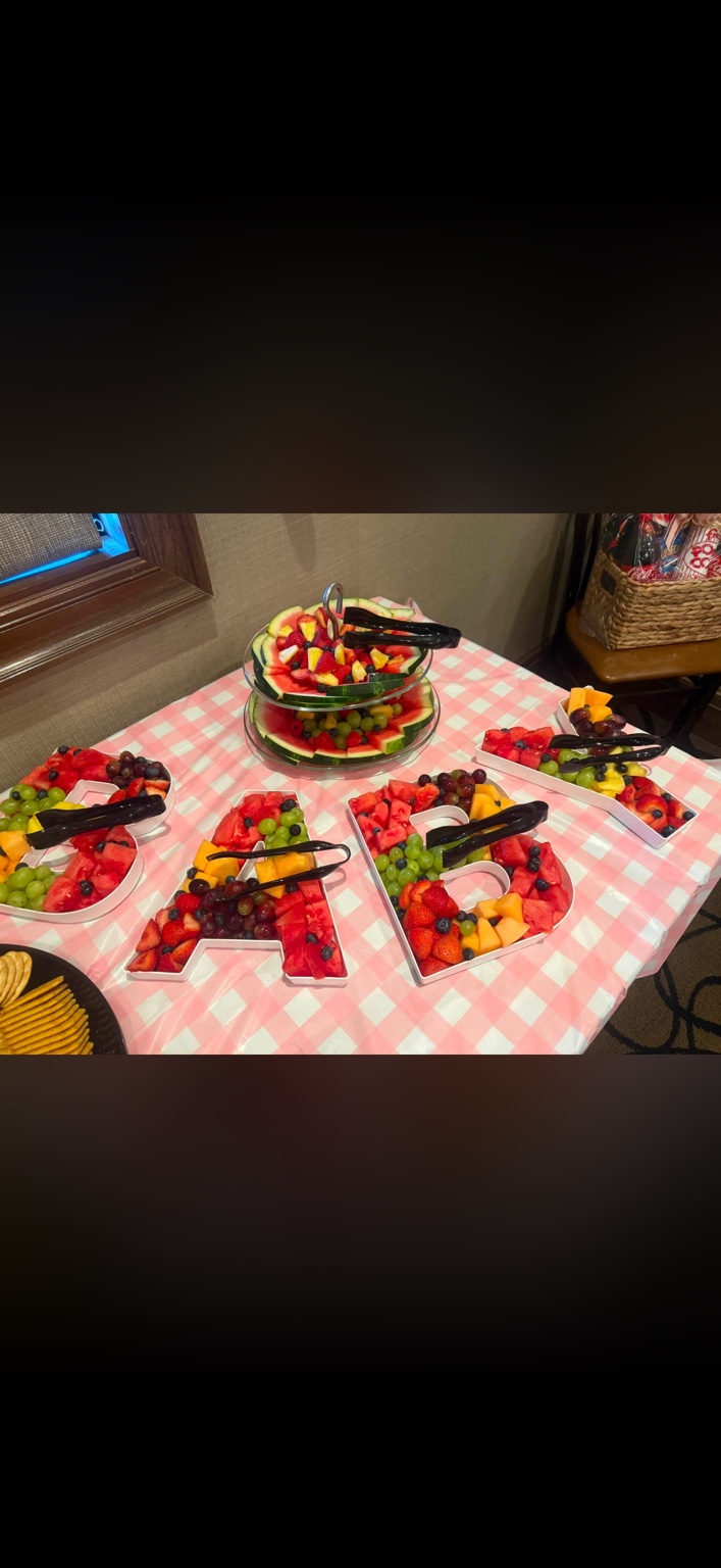 Fresh fruit platters and a tiered watermelon display