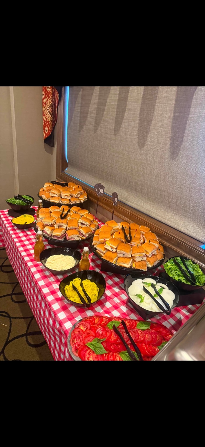 Slider sandwiches with fresh vegetables and condiments